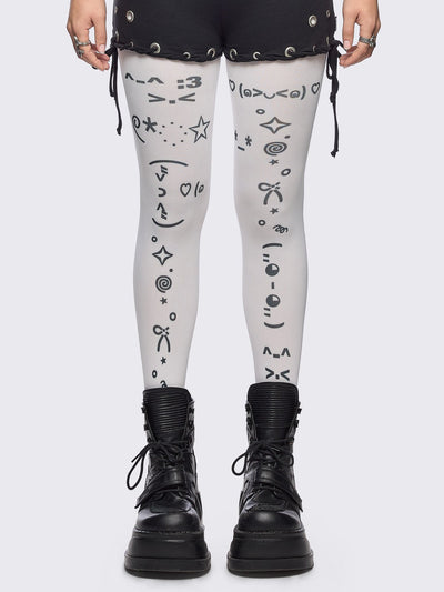 White opaque tights with kaomoji ASCII-style print.