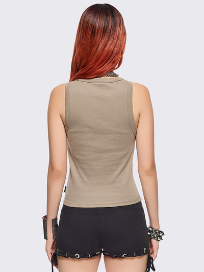 Stone tank top with black skeleton graphic front print and eyelet trim details.