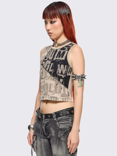 Beige and black patchwork tank top with grunge graphic front print in contrast featuring safety pin details and black contrast stitching.