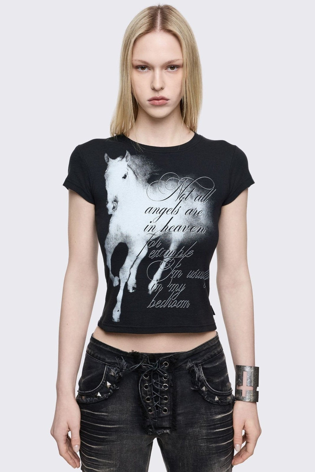Black graphic baby tee featuring a horse and "Not all angels are in heaven for example I'm usually in my bedroom" front graphic print.