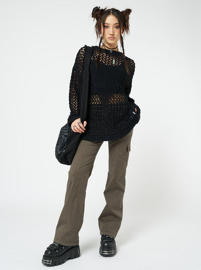 Embrace the Y2K fashion trend with these brown cargo pants featuring a stylish and functional design. Perfect for an edgy and retro-inspired look.