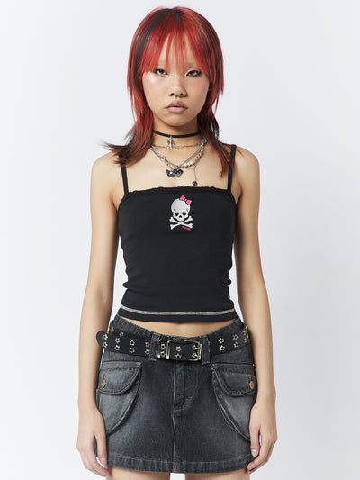 A black cami top featuring embroidered skull detail and lace trim, a unique and stylish look.