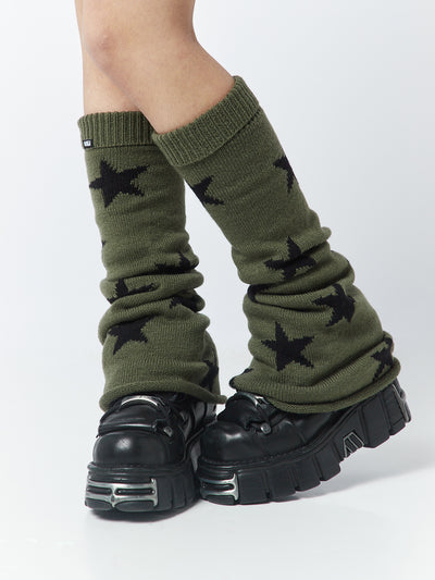 Flare leg warmers with star accents by Minga London, adding a touch of celestial charm to your outfit while keeping your legs cozy and stylish.