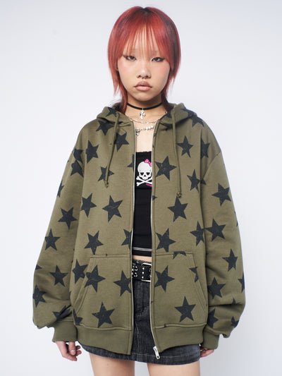  Green zip-up hoodie with stars print, combining comfort and style for a trendy and versatile look.