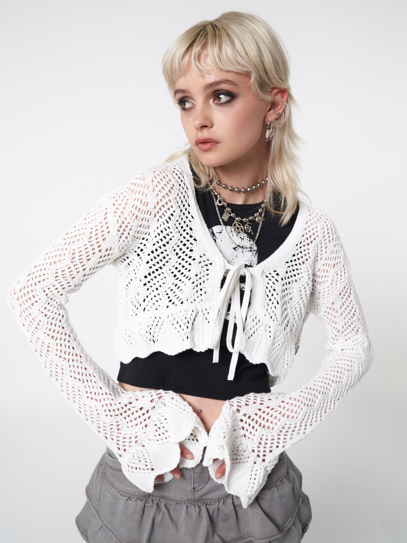 Tie front cardigan in white featuring crochet style knit pattern