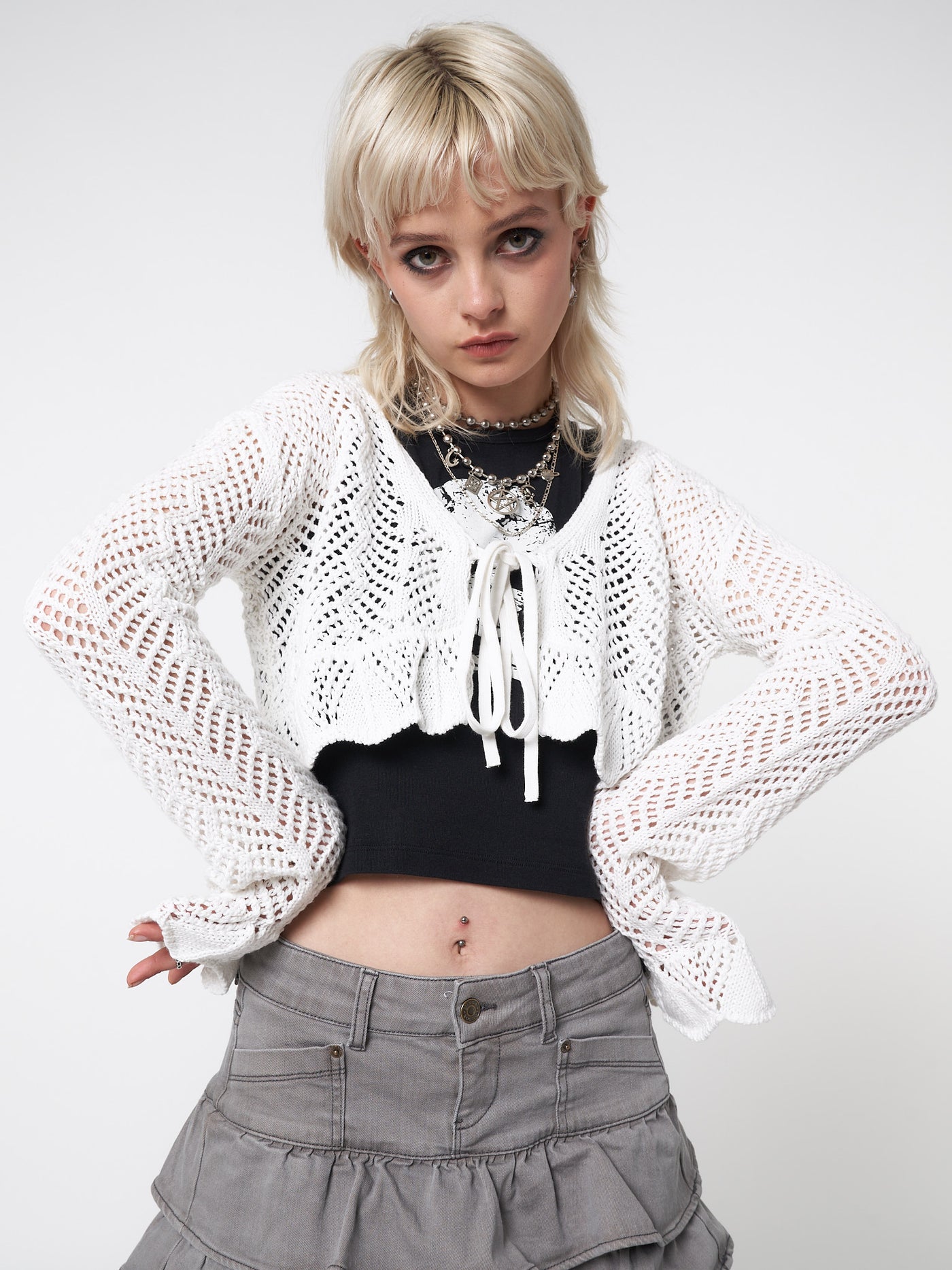Tie front cardigan in white featuring crochet style knit pattern