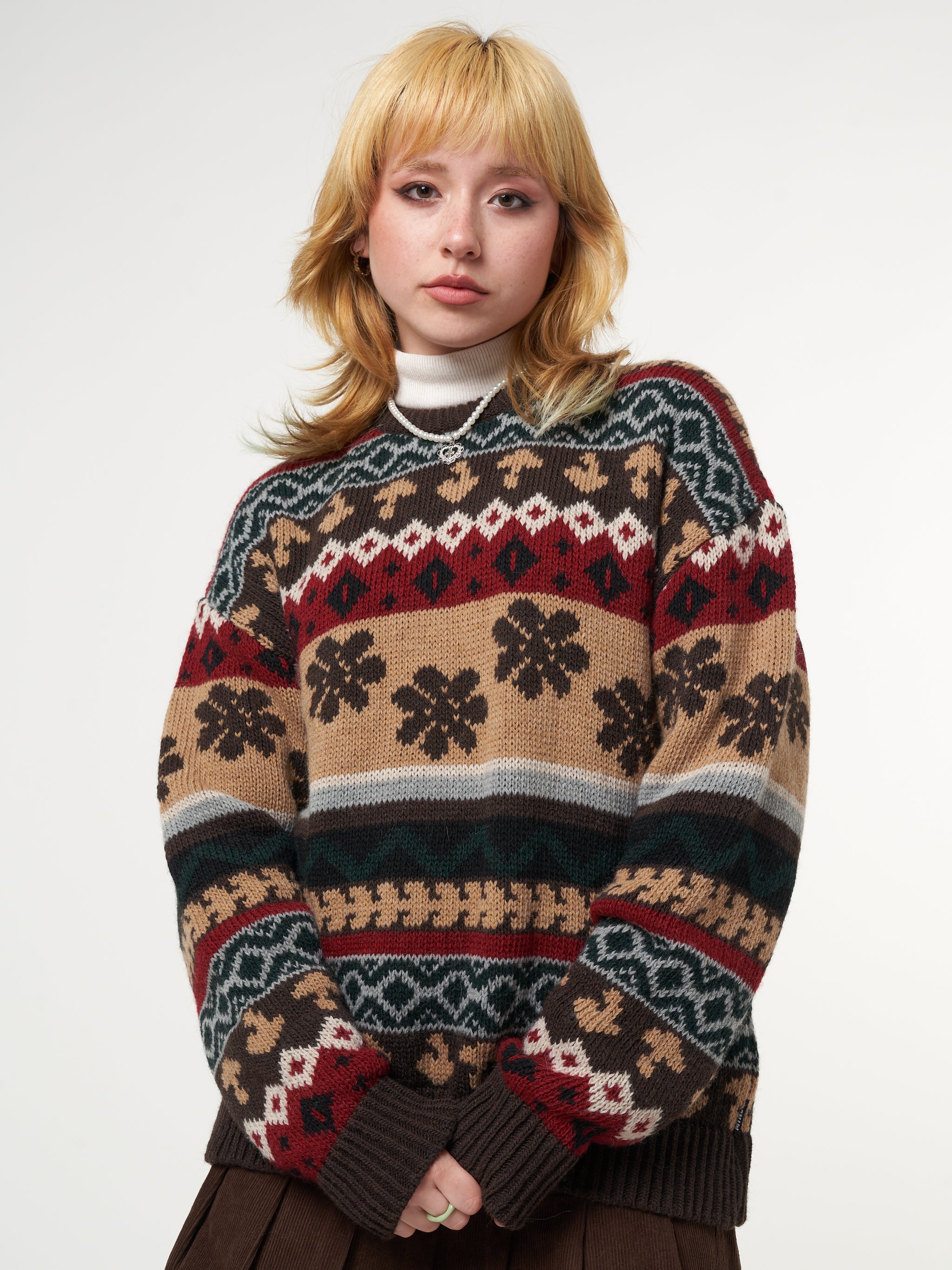 Jacquard knit jumper featuring geometric vintage striped pattern in brown, red and grey