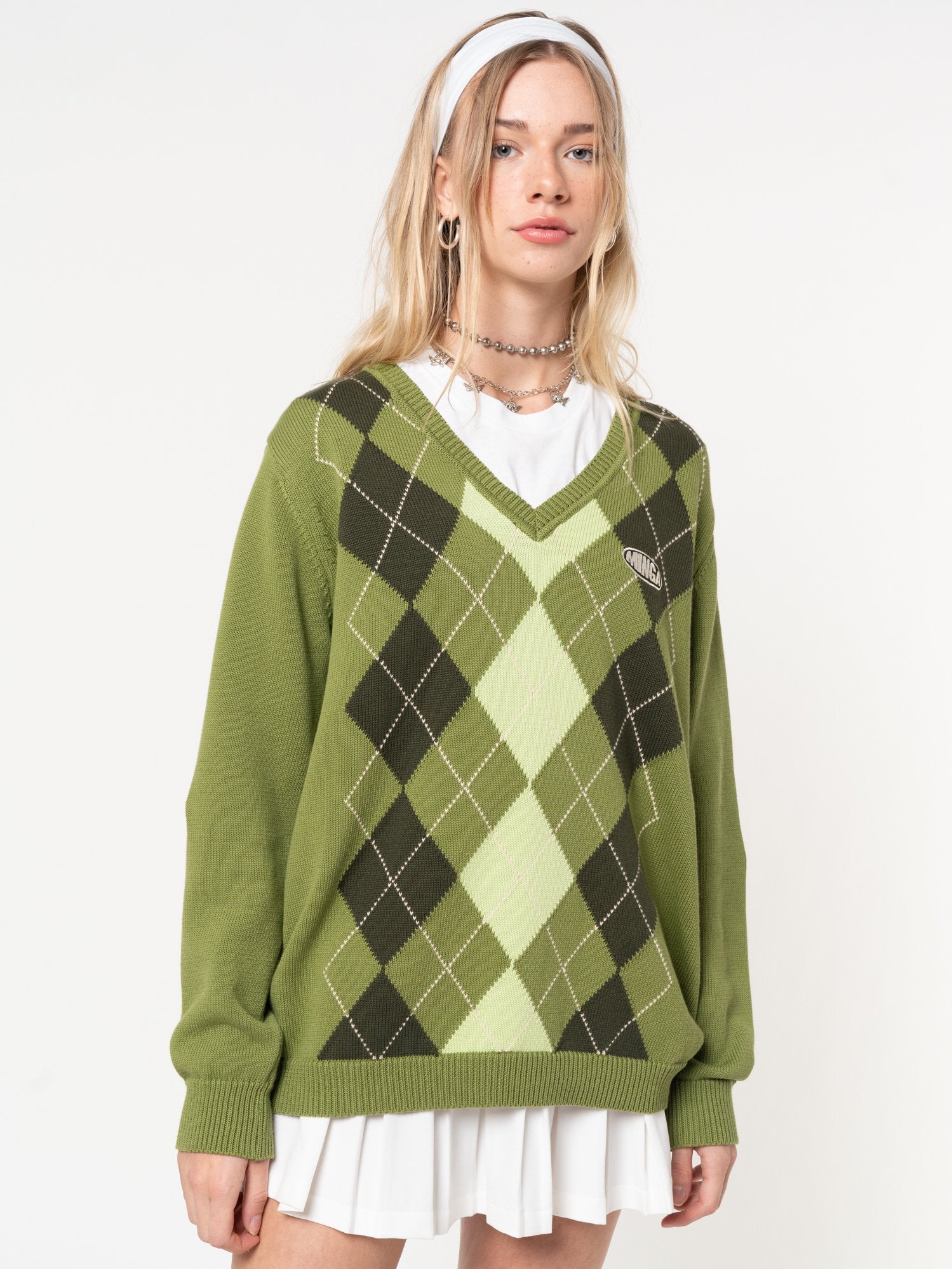 Loose knitted jumper with argyle pattern in green tones