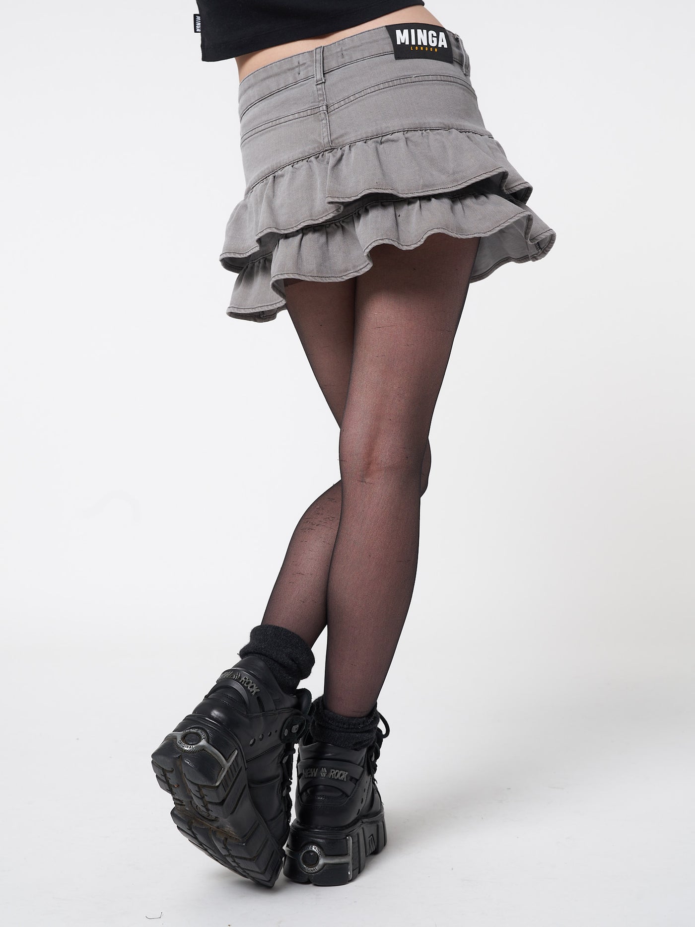 Y2k mini denim skirt in vintage light grey wash with double ruffled hemline