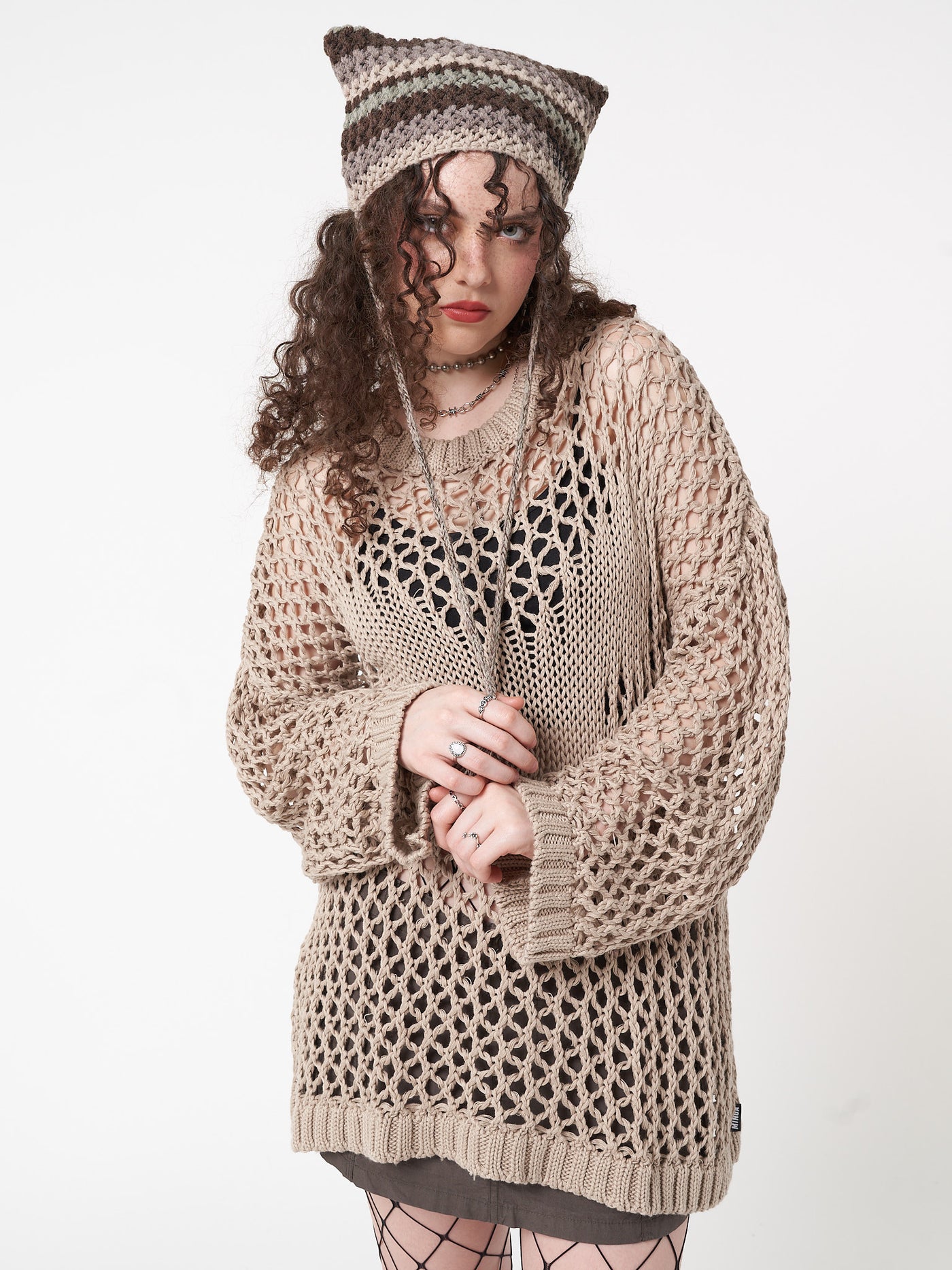 Open knit jumper in beige with butterfly front design and crochet net style
