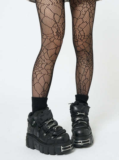 Black Forest web-patterned tights by Minga London, featuring an intricate and eye-catching design for a bold and edgy look.