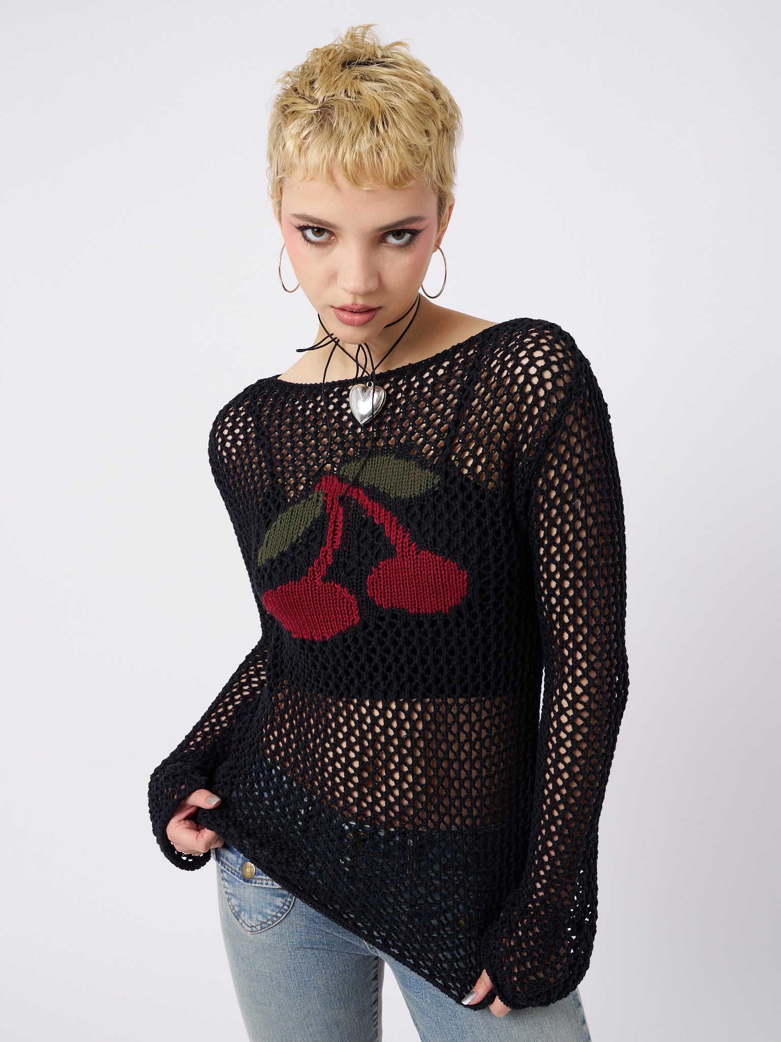 Cerise open knit jumper in black by Minga London. Versatile and stylish for a comfortable look.