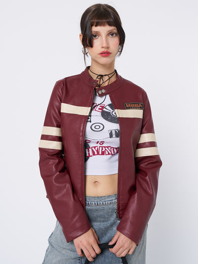 Dark red vegan leather racer jacket with beige contrast stripes. Snap button collar, Minga logo detail, zipped cuffs and pockets.