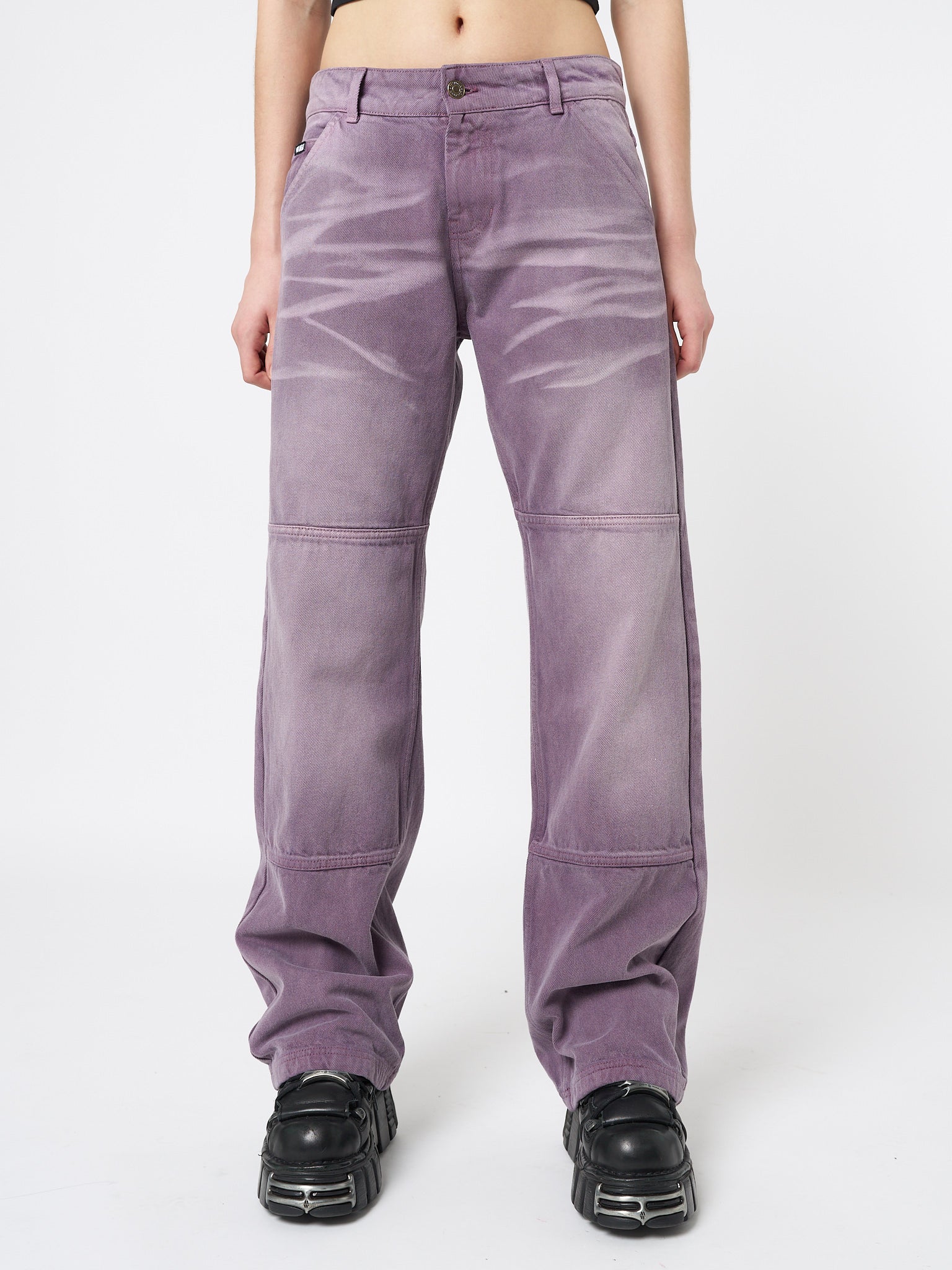 Stylish and comfortable straight jeans in a trendy washed mauve color, perfect for everyday wear.