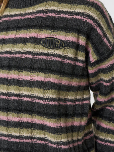 Embrace effortless style with this trendy and comfortable striped knit sweater, ideal for any occasion.