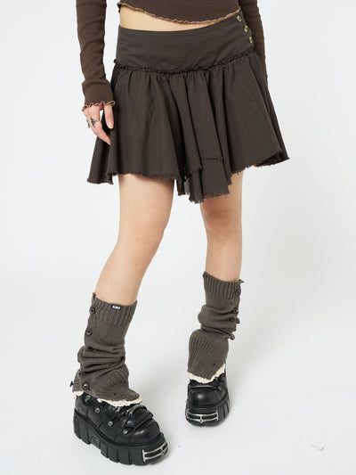 Embrace fairycore fashion with this brown layered asymmetrical mini skirt, adding enchanting vibes to your look.