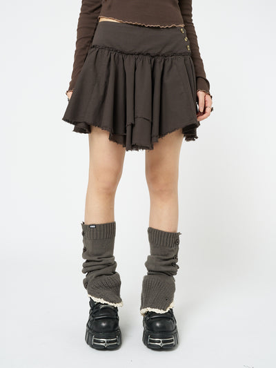 Embrace fairycore fashion with this brown layered asymmetrical mini skirt, adding enchanting vibes to your look.