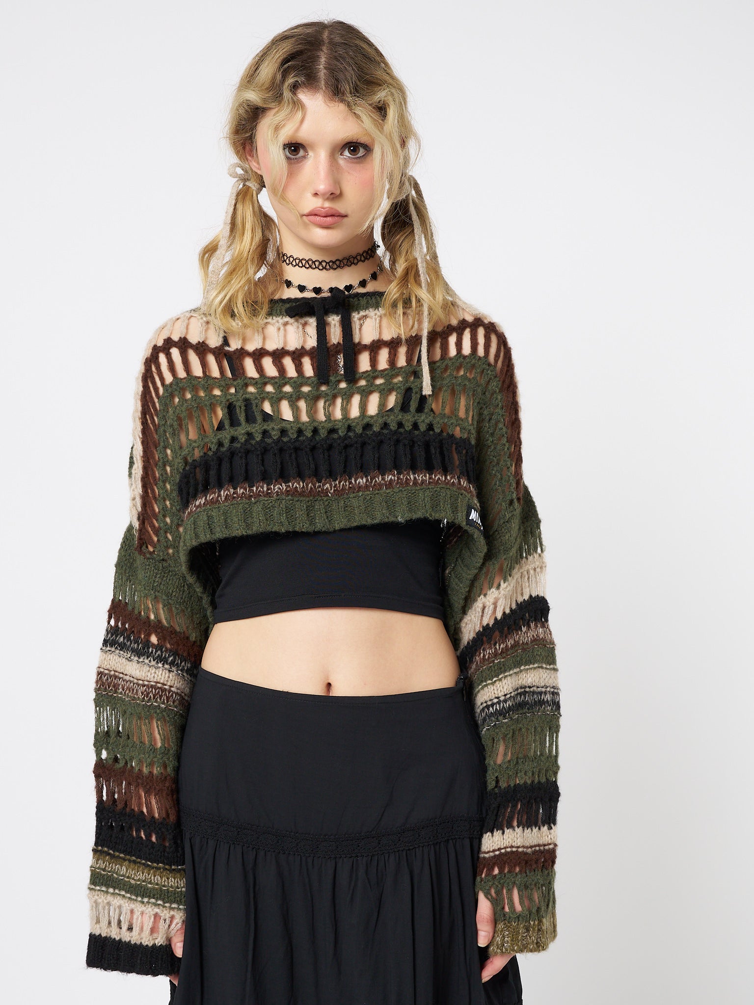 Bold, trendy, and cozy, this green extreme crop sweater is a fashion statement.
