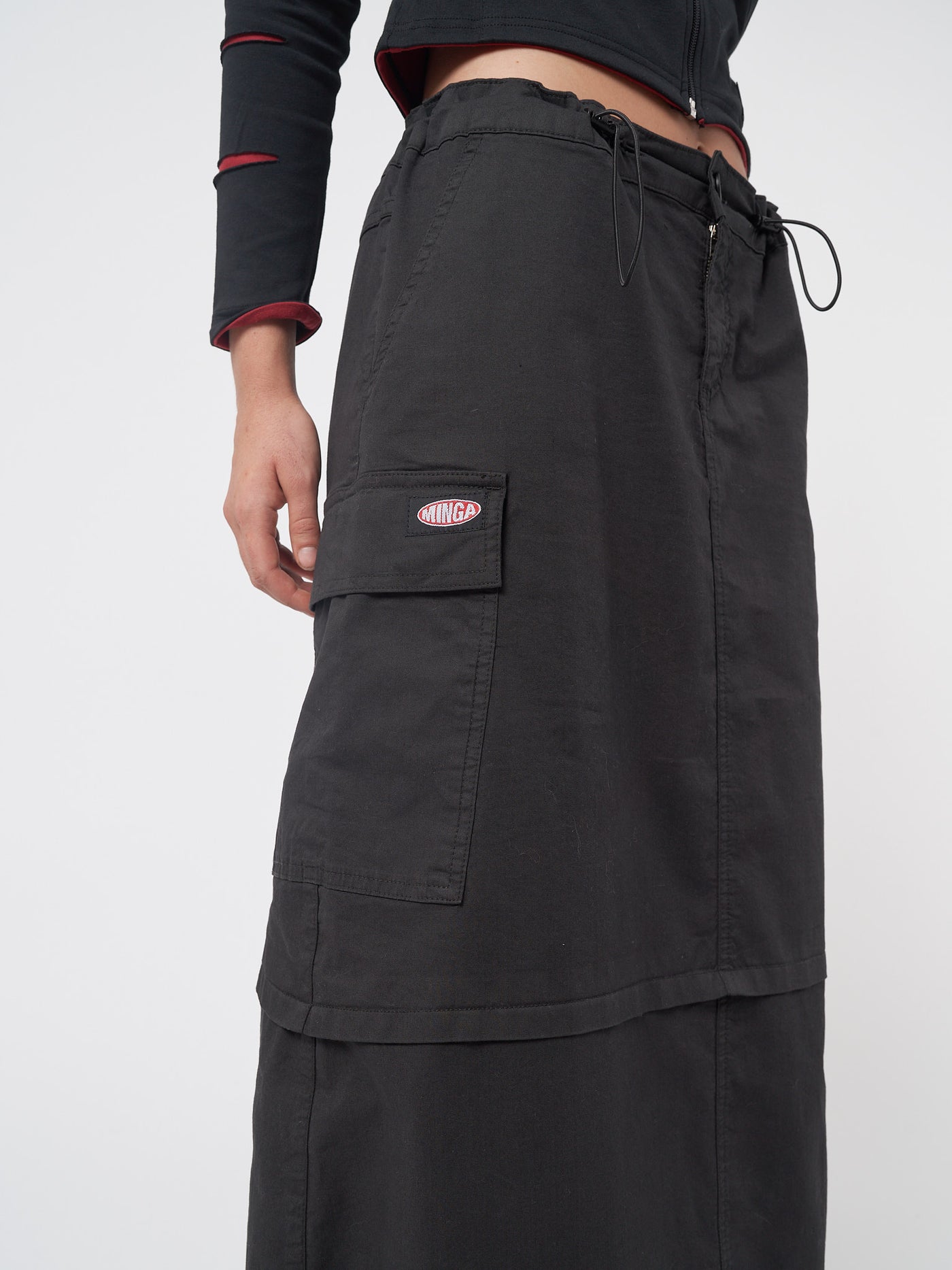 Black cargo maxi skirt in parachute style with side utility cargo pockets