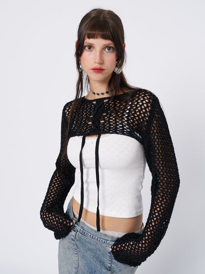 Trendy and versatile black knitted shrug with a lace-up detail. Perfect for adding an edgy and fashionable touch to any outfit.