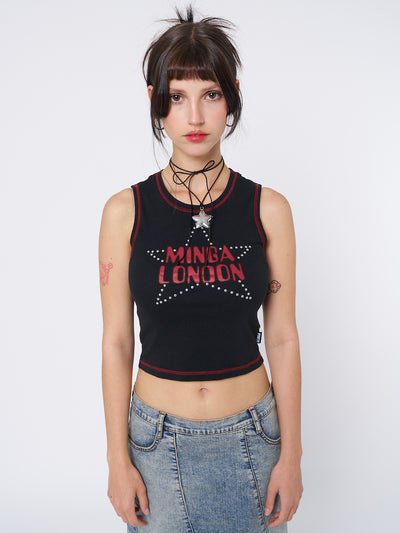 A black RockStar Girlfriend vest top by Minga London. This top exudes a cool and edgy vibe, perfect for channeling your inner rockstar.