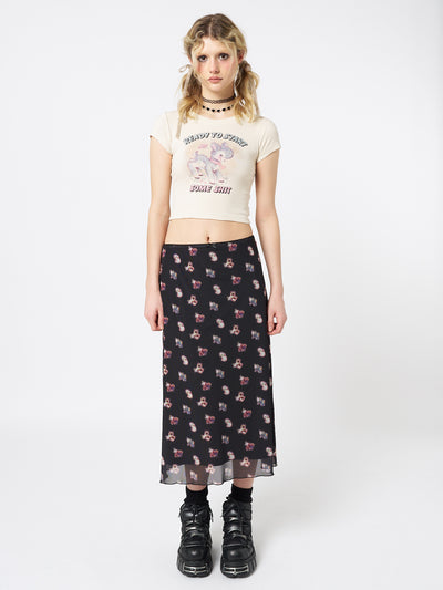 A midi mesh skirt named "That Cat Girl" by Minga London. This skirt showcases a playful and trendy design with its mesh fabric and cat-inspired motifs, adding a touch of fun and whimsy to your look.